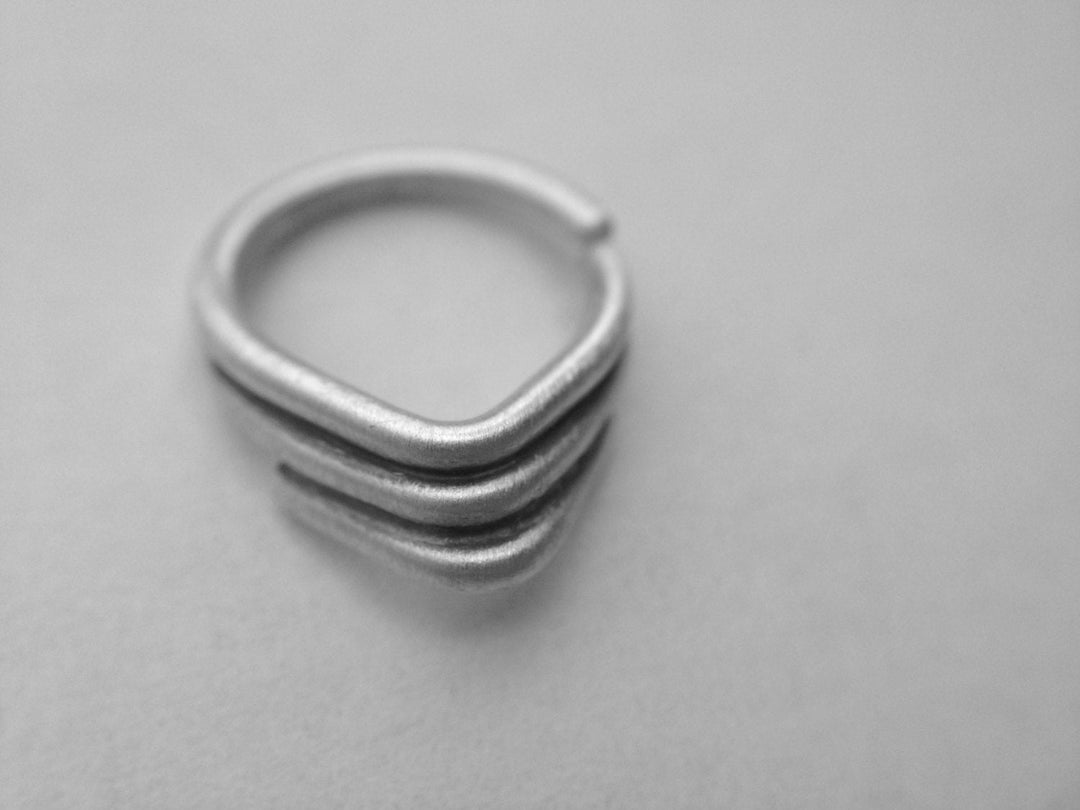 Layered Chevron Septum Ring